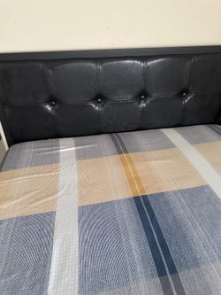 Full-size bed with a 12 inch mattress firm