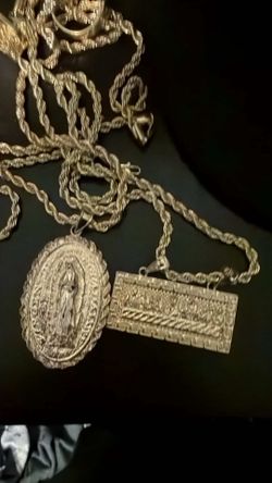 gold plated last supper and Virgin Mary