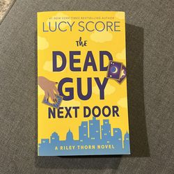 the Dead Guy Next Door - Lucy Score