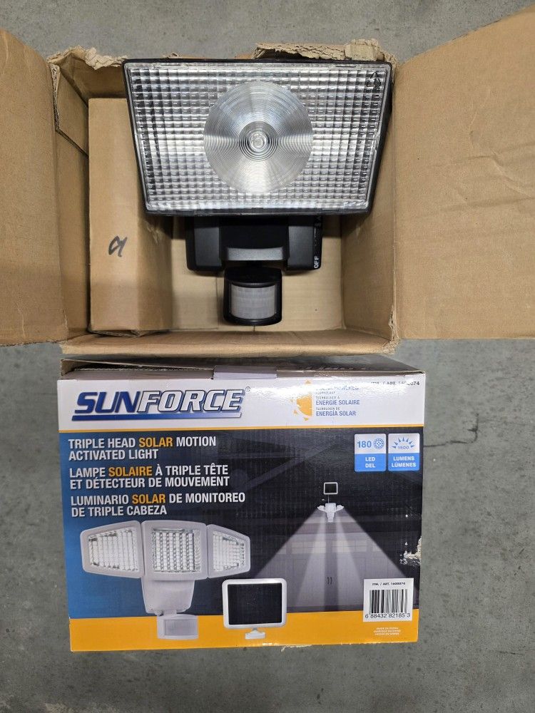 Lot Of (2) Solar Motion Activated Security Lights.