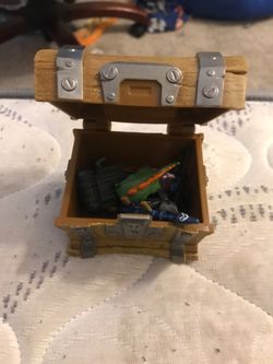 Fortnite Chest Full of 10 Fortnite In Game Guns and 4 In Game Backblings/backpacks