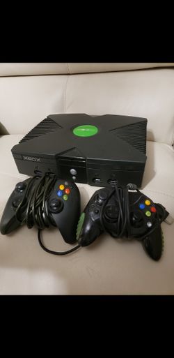 Original XBOX comes with All Cords and 2 Controllers 