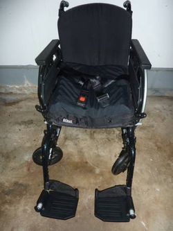 Wheelchair with cushion and foot rests Drive Brand