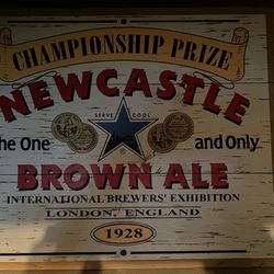 Newcastle Wooden Sign