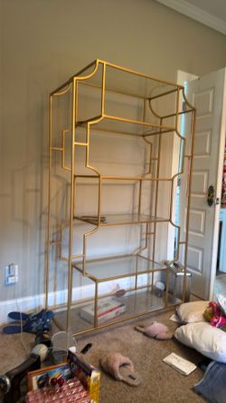 Gold and glass shelf