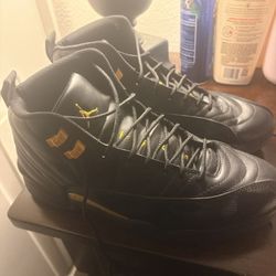 retro Jordan 12s black taxis