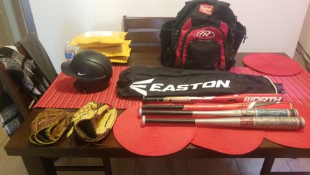 Rawlings Bag.easton bat bag. Nike helmet Wilson A500 #12 glove.rawlings #11 glove. USA 29 bat USA 30 bat .Louisville 30 30 Easton bat.