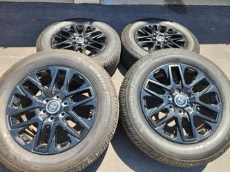 20" Toyota Tundra Sequoia black factory wheels and tires