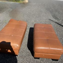 Two leather Ottomans