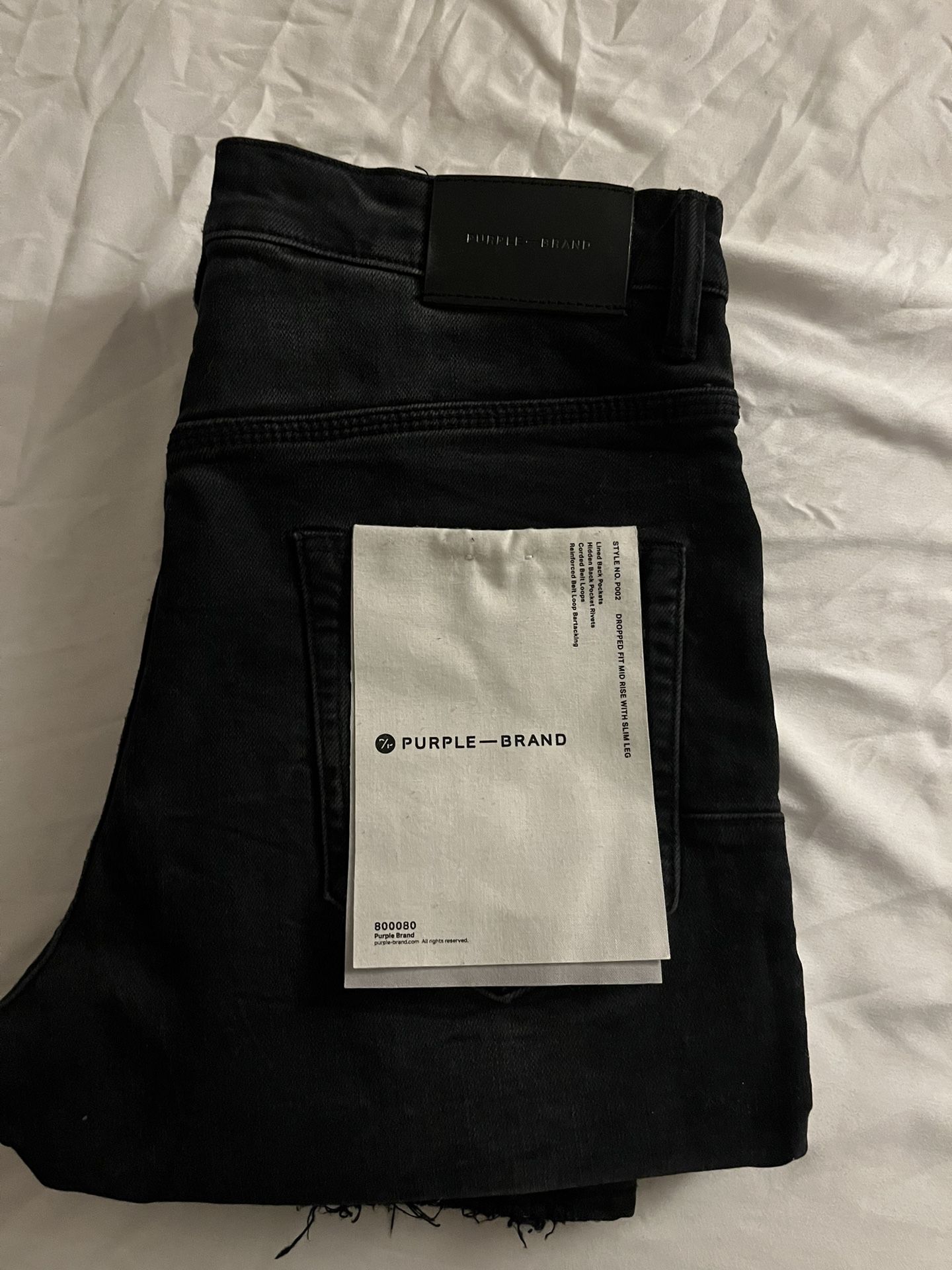 2 pairs of purple jeans