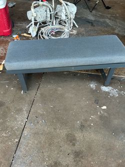 Gray Upholstered Bench with Metal Frame