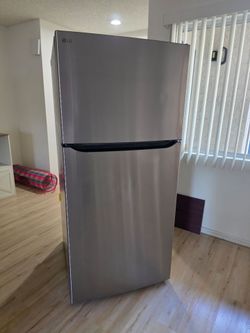24 cu. ft. Top Mount Freezer Refrigerator with Multi-Flow Air System in Stainless Steel, Garage Ready