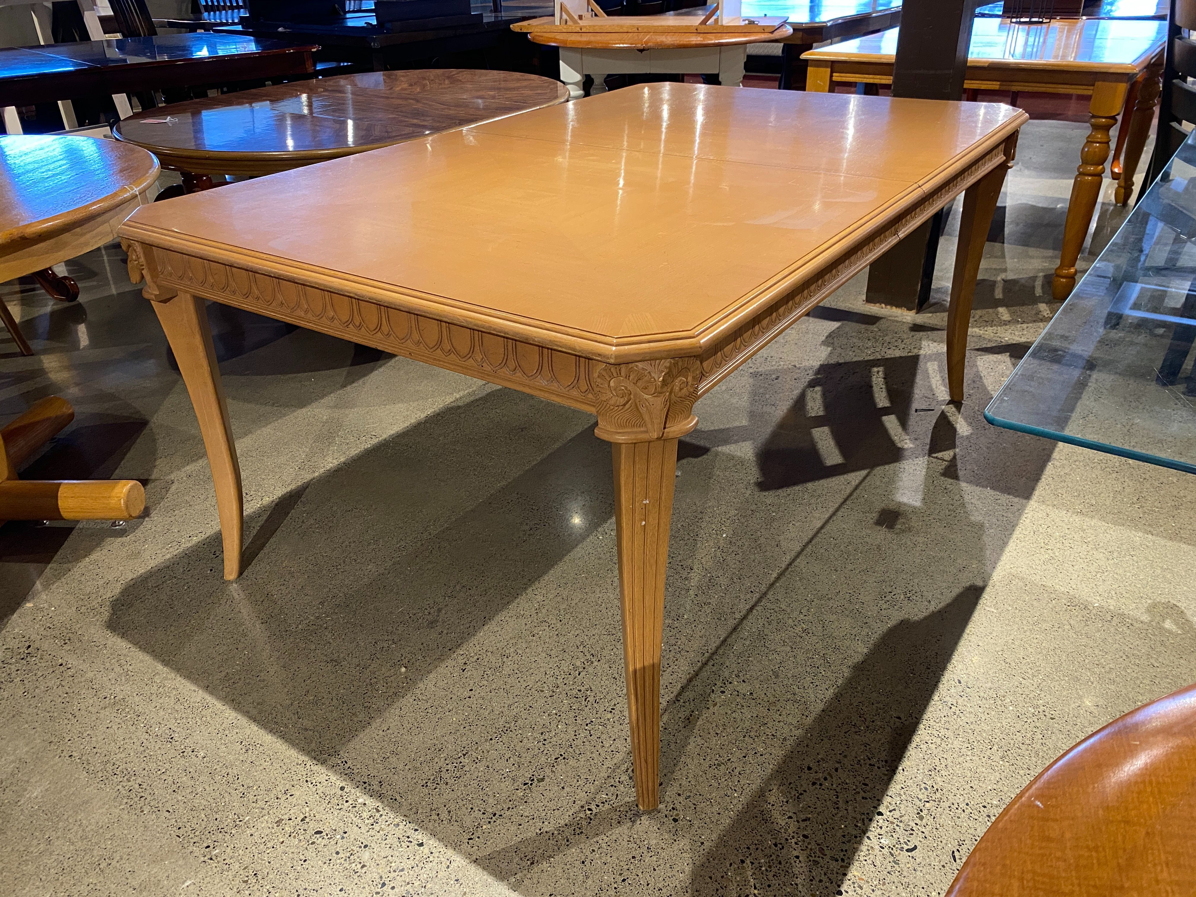 Blonde Extendable Dining Table with Carved Ram Head Corners