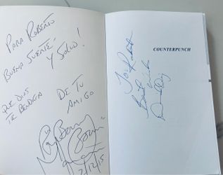 Ray “Boom Boom” Mancini and David Diaz signed book, “Counter Punch”.