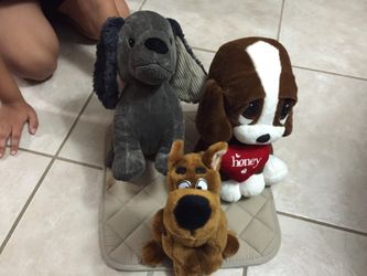 3 dog plushes