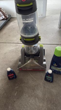 Hoover Dual power carpet washer and  some Bissell cleaners
