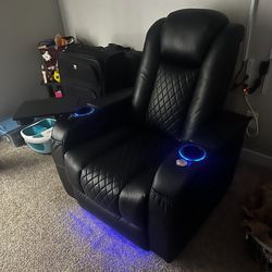 All black reclining gaming chair, very new condition