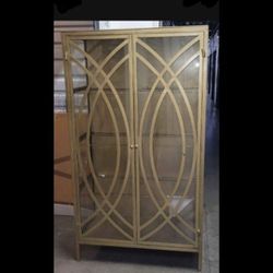 $60 Gold Metal Armoire