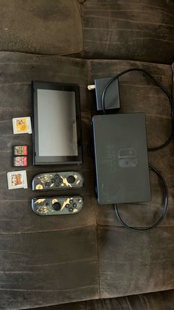 Switch v2 with games,controllers,and charging dock