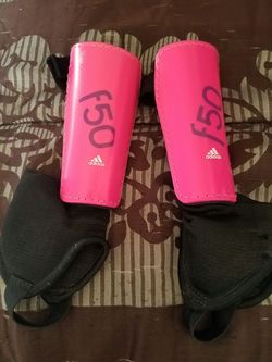 Espinilleras para niña....