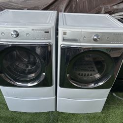 Kenmore Elite Steam jumbo washer and electric dryer on pedestals 