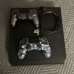 PS4 Slim With 2 Controllers And Games