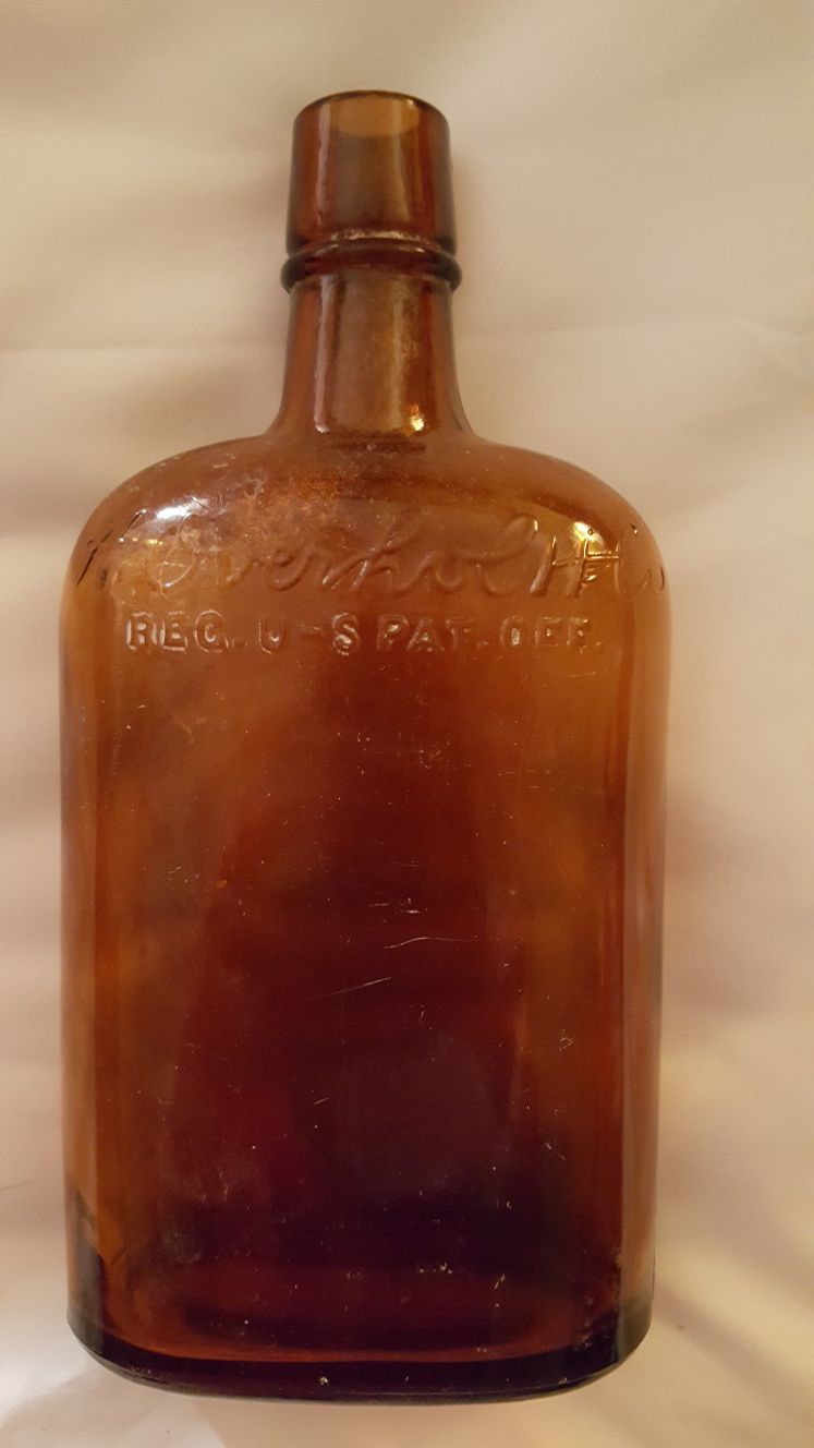 Antique amber whiskey bottle