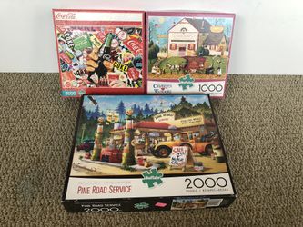 3 Buffalo Puzzles 2 - 1,000 Piece and 1 - 2,000 Piece