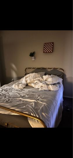 Gold and sturdy metal bed frame