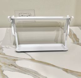 Tiered metal shelf