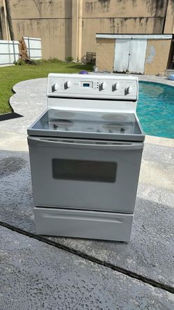 Estufa Eléctrica Whirlpool de 4 Quemadores con Horno y Gaveta Inferior
