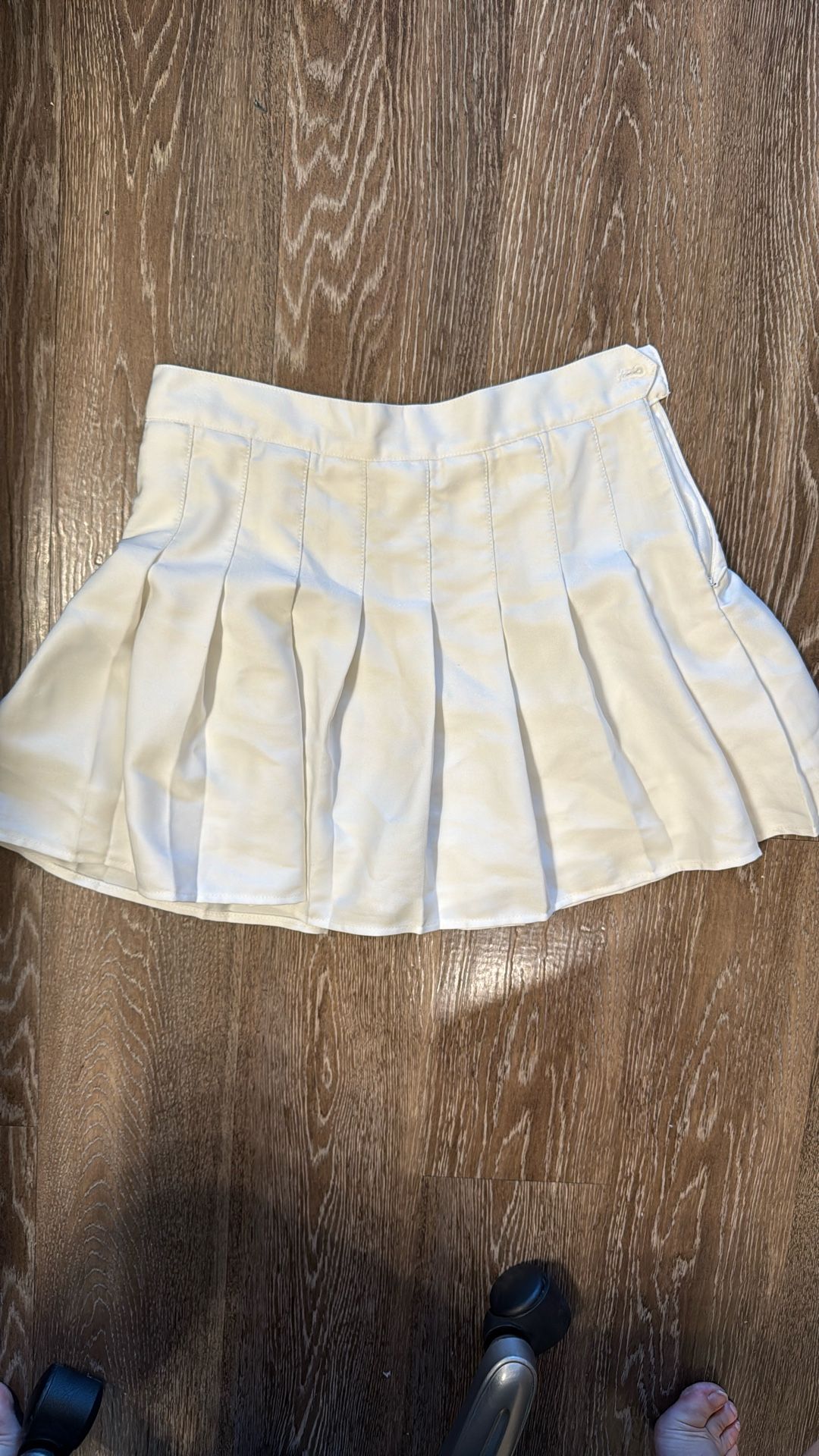 White pleated skirt