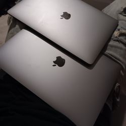 2 Brand New Apple  Mac Books 