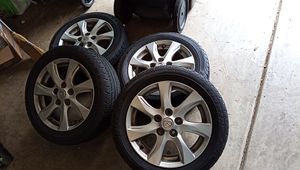 Photo 2011 Mazda 3 i Touring wheels and tires $160 Firm please
