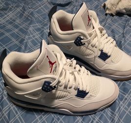 The white and blue Jordans