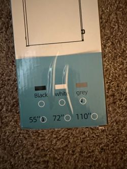 Retractable baby gate
