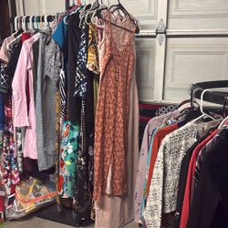 Lots Of Woman’s Clothes Left 