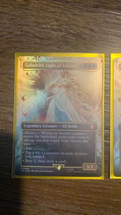 Galadriel, Light of Valinor" Borderless Foil Rare from The Lord of the Rings: Tales of Middle-earth set.