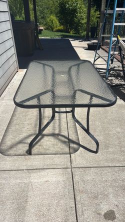 Glass top outdoor table