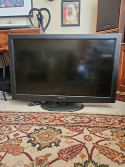 Panasonic LCD TV. 35" Wide. 25" High.
