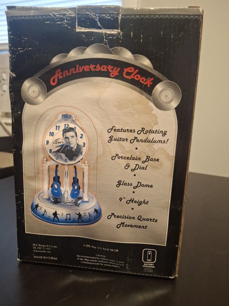 Elvis Presley Anniversary Clock With Rotating Guitar Pendulums
