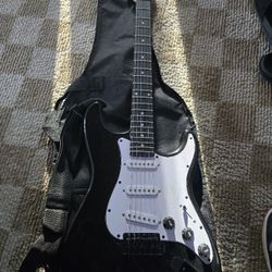 Guitar With Amp And Stand