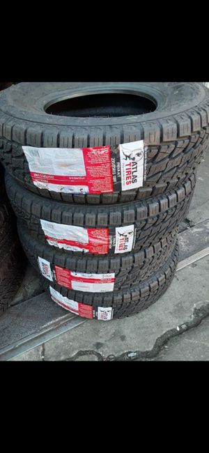 Photo New tires set 235 75 15