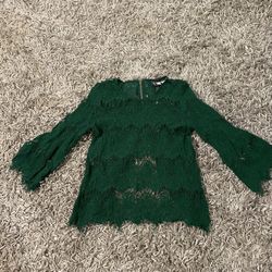 Adorable green lace women’s top. Size L but fits more like a small. Zips up back w/half open back