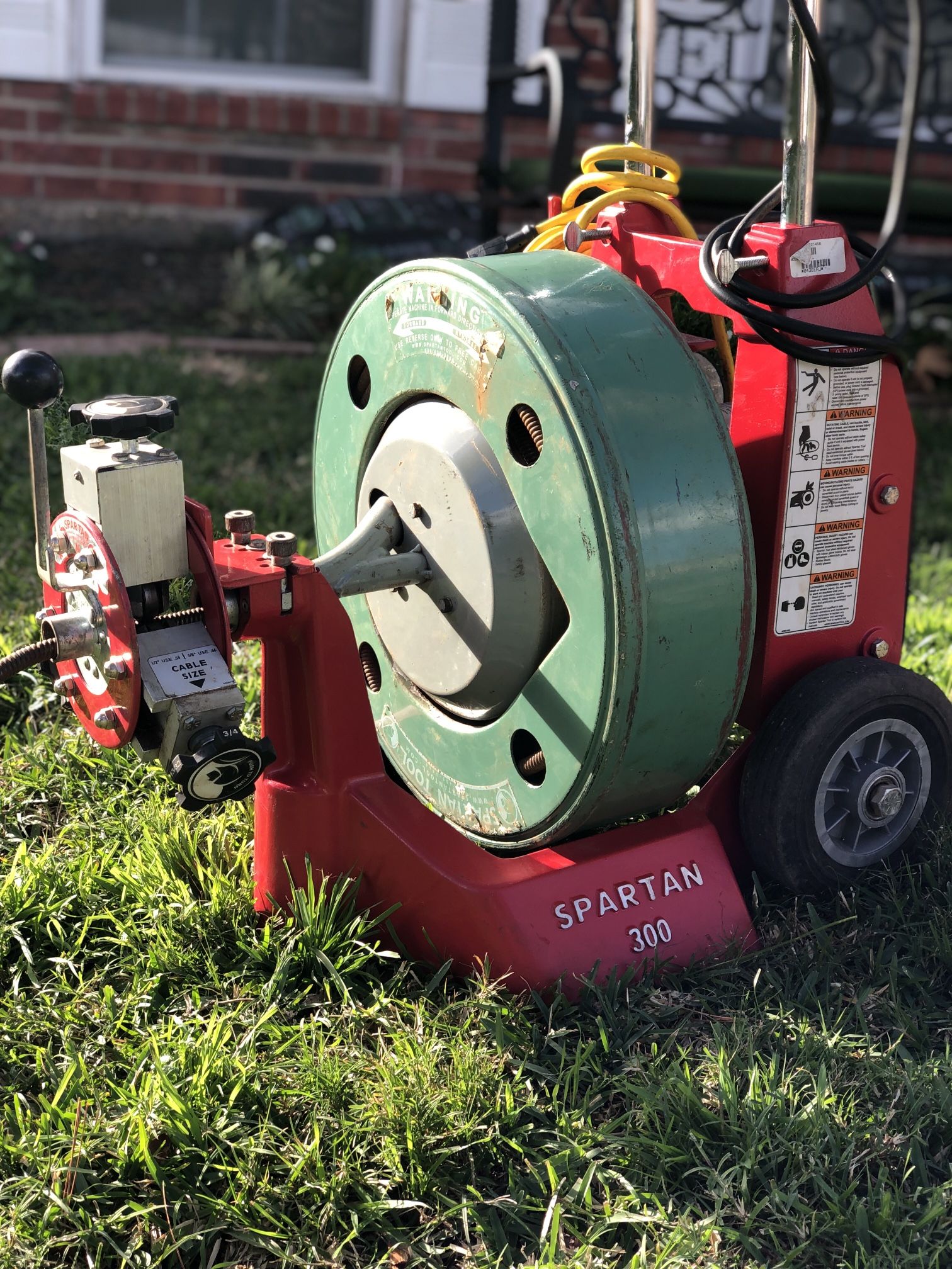 SPARTAN MODEL 300 DRAIN CLEANING MACHINE WITH 100' off .55 MAGNUM CABLE.