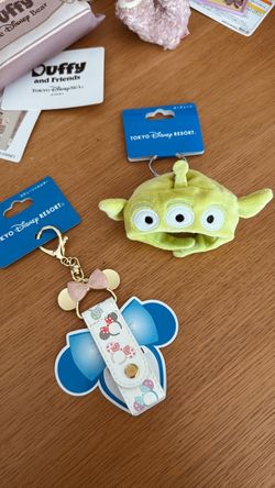 tokyo disney alien keychain and minnie mouse keychain