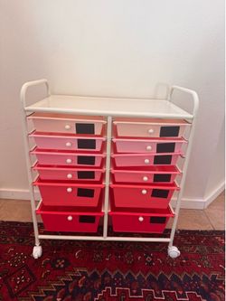Rolling storage cart with drawers