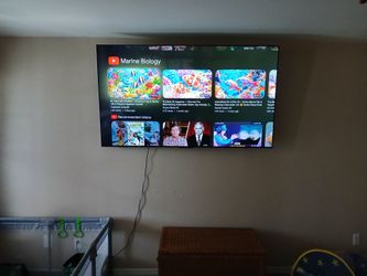 NEW 65" TCL 4K Smart TV + Wall Mount + Warranty