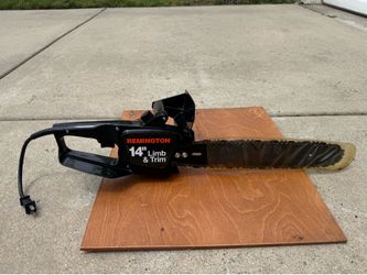 Remington 14" Limb & Trim electric chainsaw features a powerful 8-amp motor for fast cutting