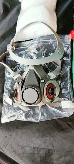 Brand new half face respirator comes with 10 filters two cartridges $20